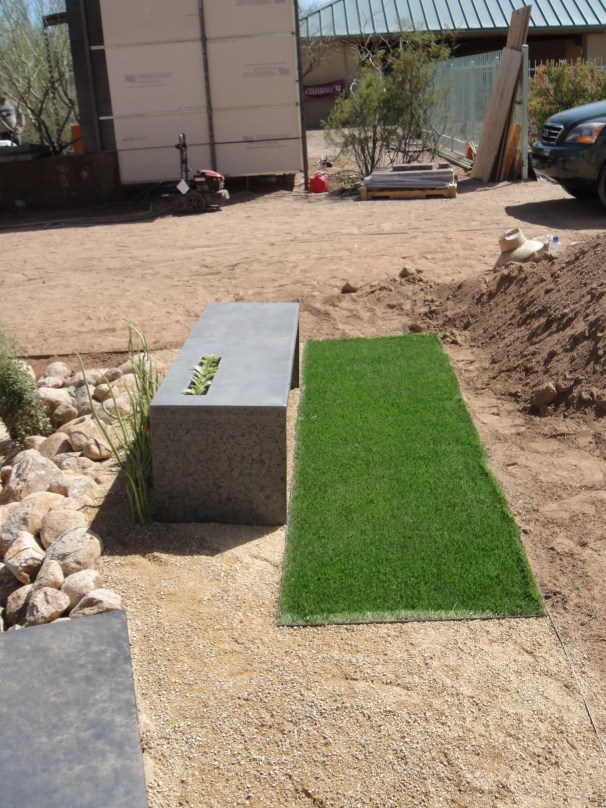 bench and fake grass