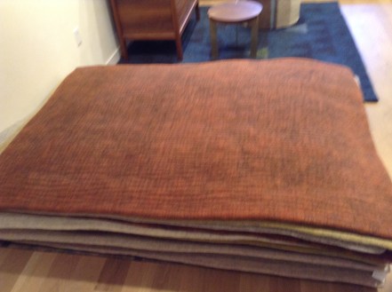 stack of rugs